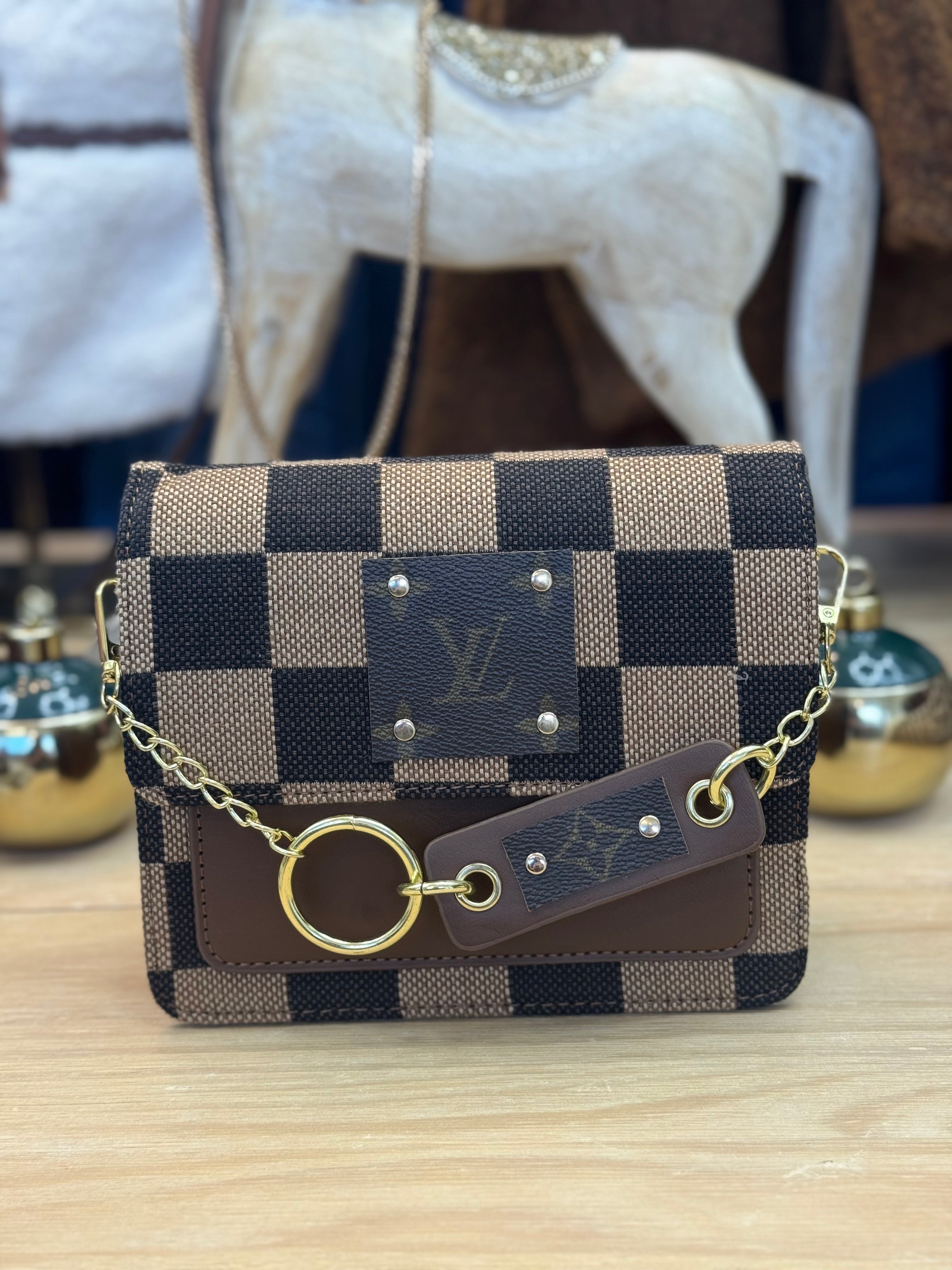 The LV Checker Chain Crossbody